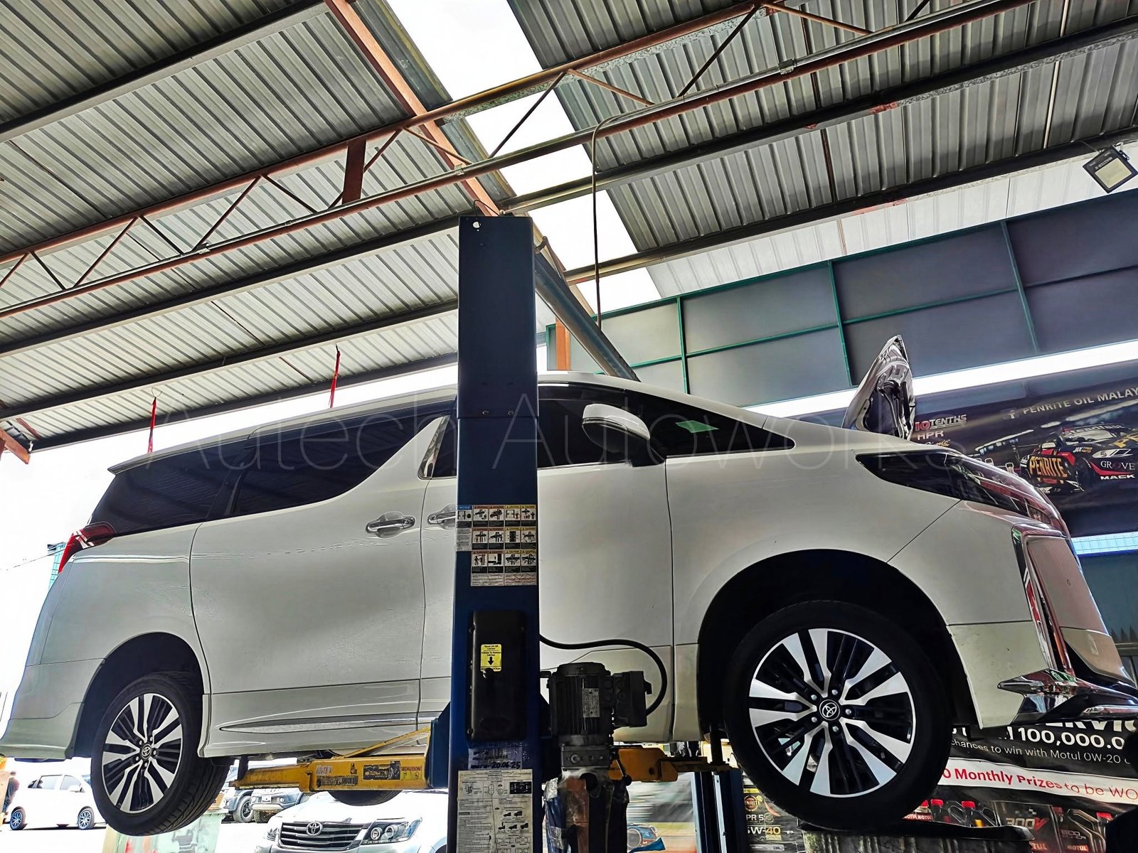 Active car lift and diagnostics at Autech Autoworks workshop Miri