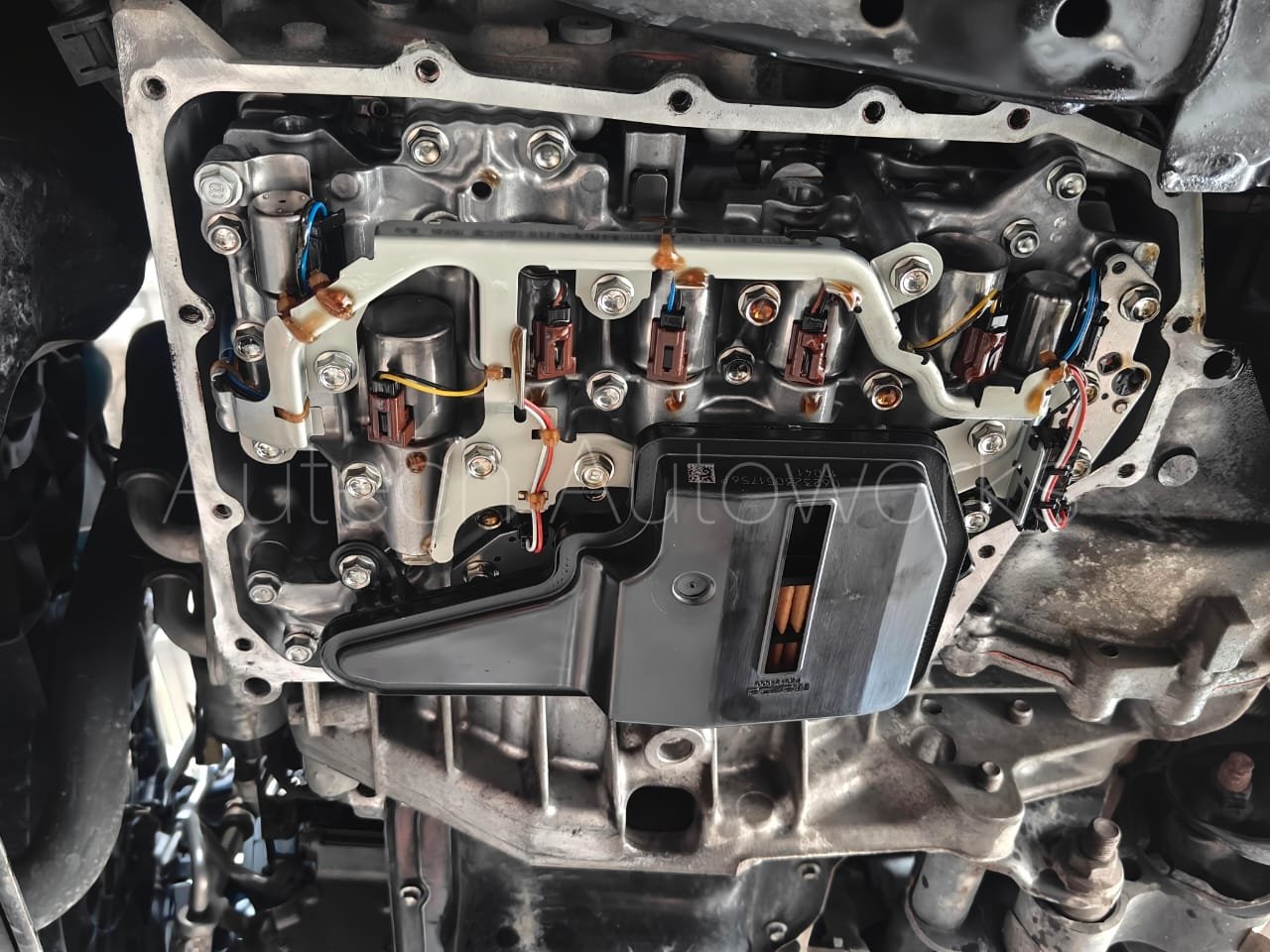 Undercarriage protection SIKAFLEX coating on vehicle body