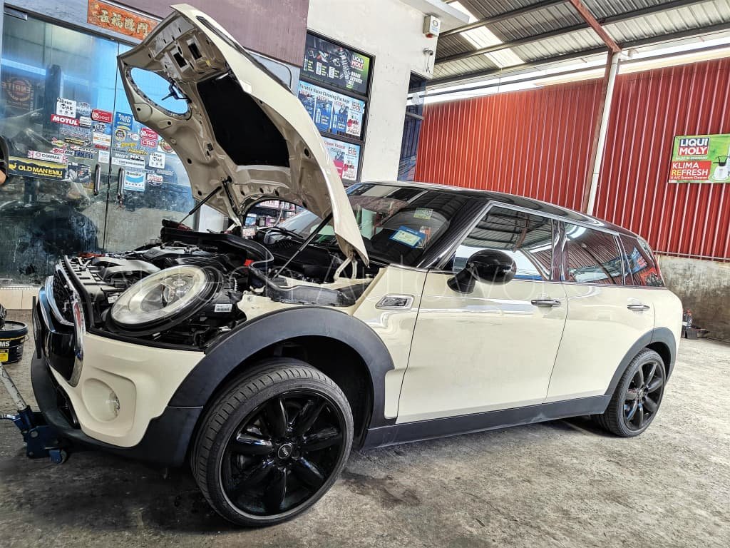 Front shock absorber coil spring replacement