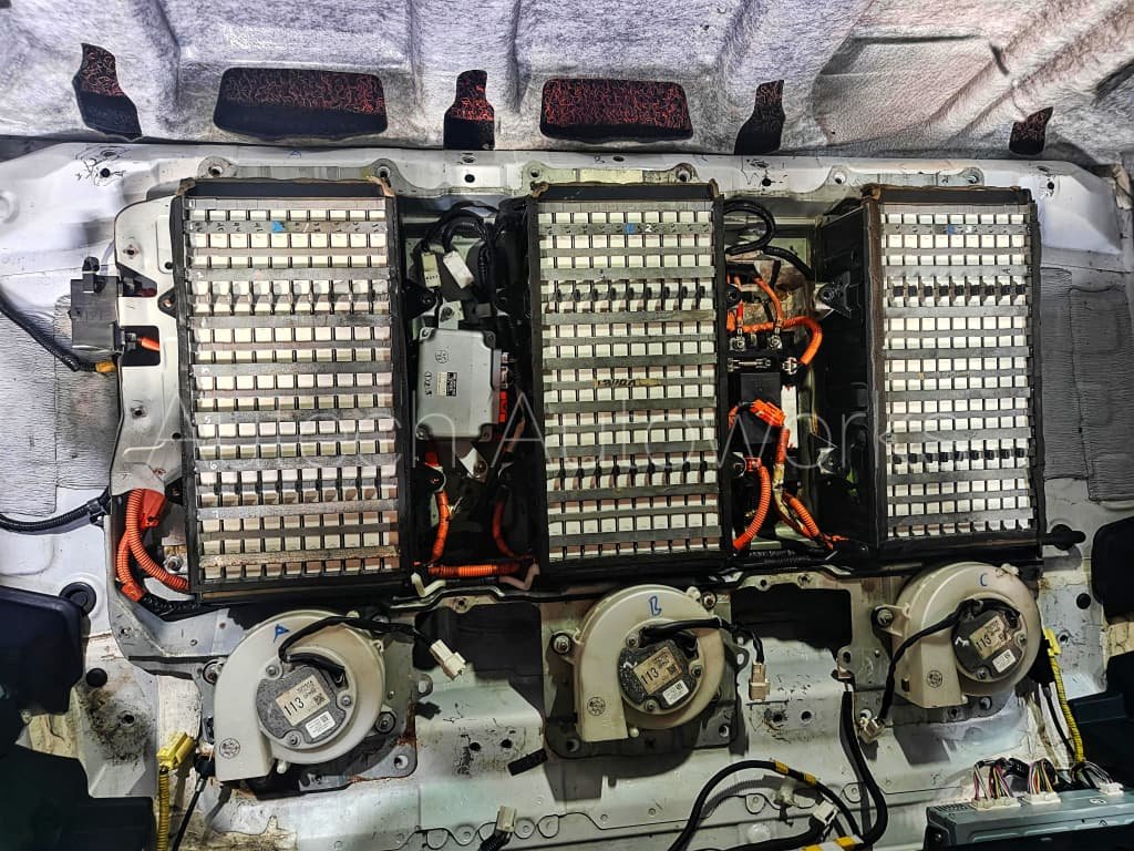 Synthetic motor oil pouring into engine top cover